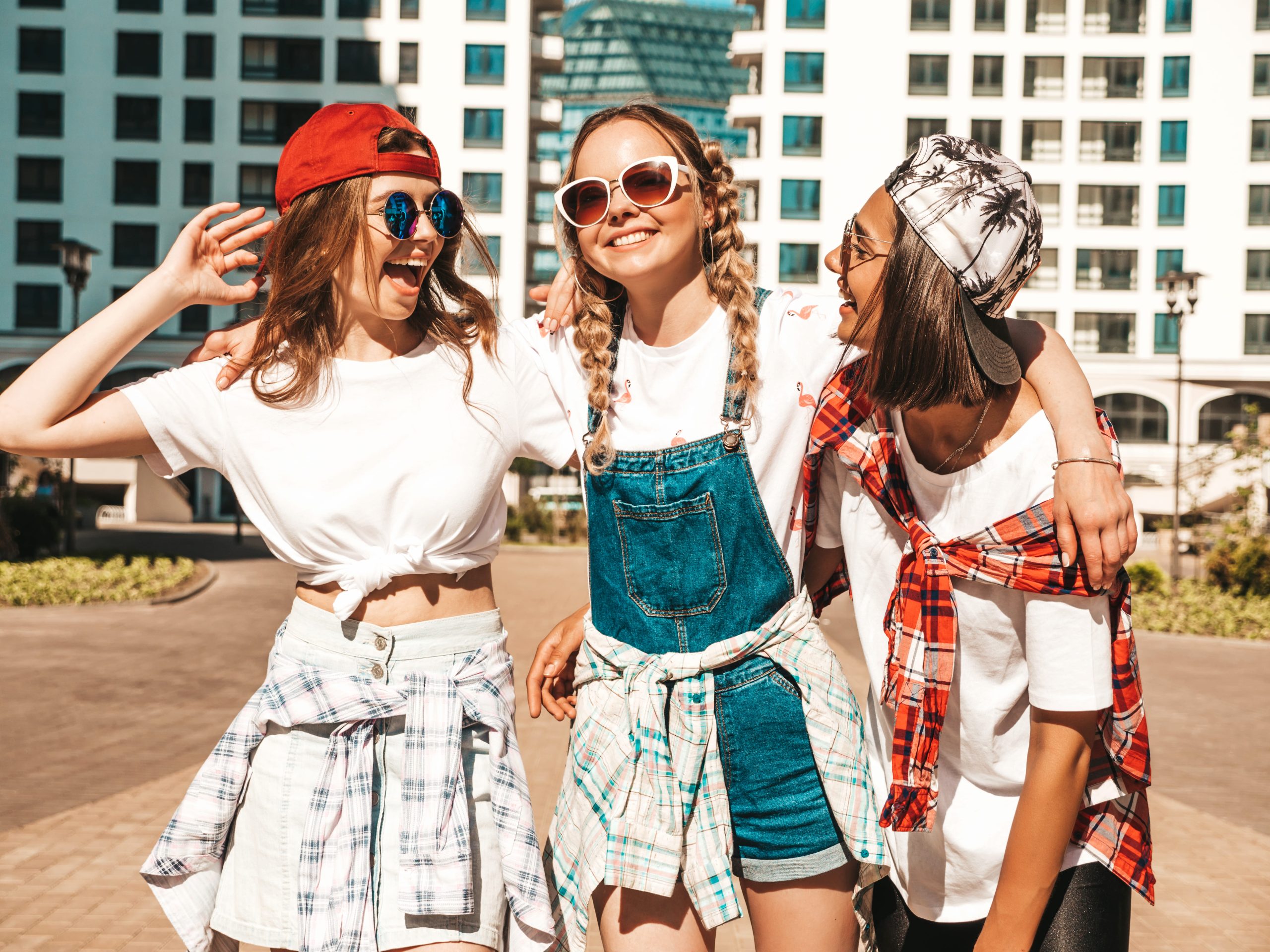 portrait-three-young-beautiful-smiling-hipster-girls-trendy-summer-clothes-carefree-women-posing-street-background-positive-models-having-fun-going-crazy (1)